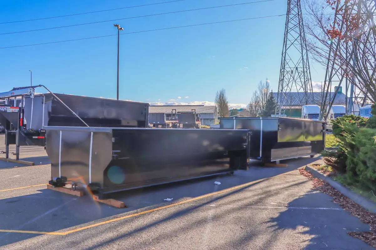 Roll-off dumpster ready for waste disposal at job site for Commercial Dumpster Rental in Myrtle Grove